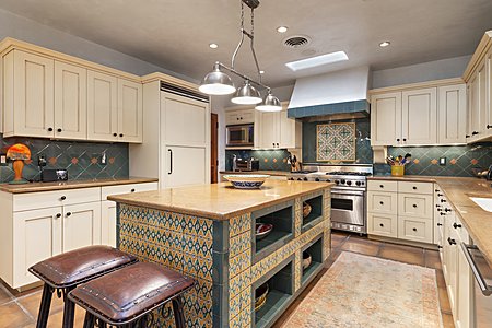 Chef's kitchen with hand painted tile island