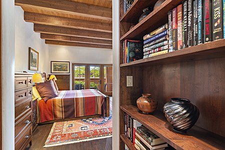 Master suite with built in bookshelf