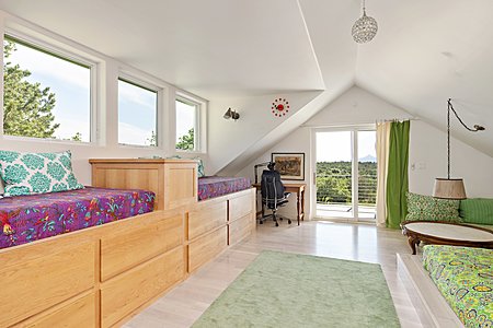 Guest bedroom 2 with deck overlooking meadow views