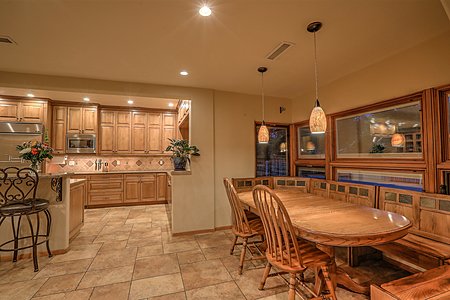 Integrated custom kitchen nook with views to the front yard 