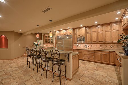 Chef's Kitchen with monogram appliances and granite countertops