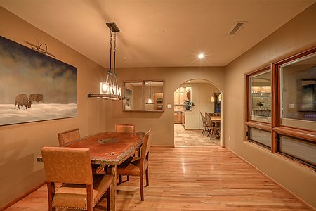 Separate formal dining area with view windows 