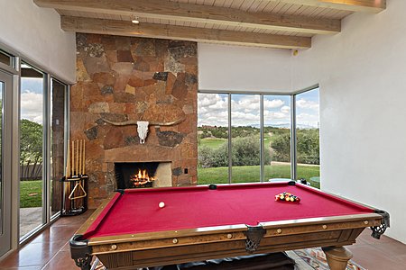 Living Room has additional space for a pool table on the Golf & Mountain Views