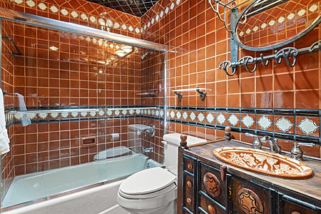 Bathroom #2 has fabulous tile work!