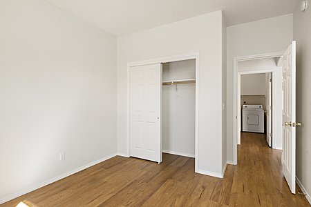 Guest Bedroom 3, closet, hallway to utility room