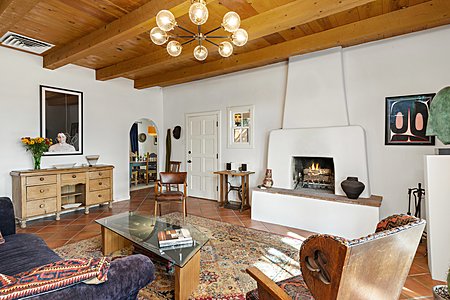 Elegant living room with wood burning fireplace