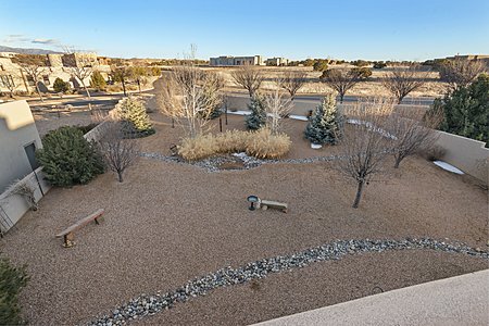Looking down at the Spacious Back Yard area from the Roof-top Deck