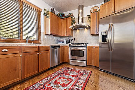 Stainless steel appliances in the roomy Kitchen