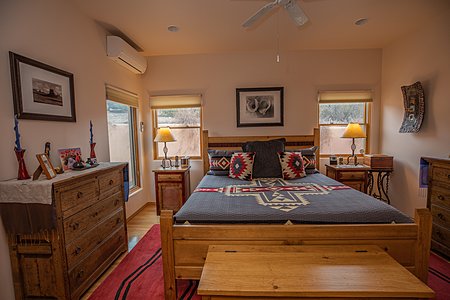 Large First Bedroom with mini split and ceiling fan