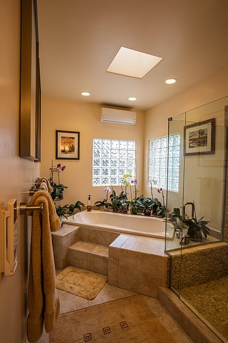 Owners suite Spa bath room with soaking tub and walk in shower, and a spectacular closet you must see!