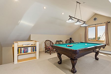 Upper level game room or studio space 