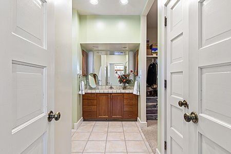Looking through Double Doors from Bedroom into Owner's Bathroom