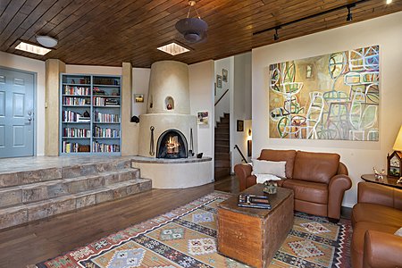 Living Room w/ Kiva Fireplace & Entry Landing