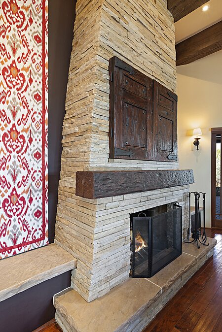 Amazing hand stacked Chaco flagstone & TV built-in over fireplace!