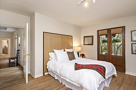 Bedroom of Guest Suite Two also has French Doors to Portal