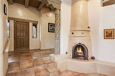 Entry view with John La Master signature Kiva fireplace