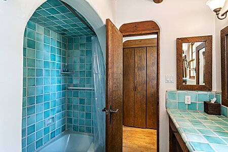 Bathroom tiled tub/shower surround & ceiling