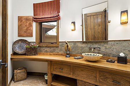 Powder Room with Custom Cabinets and Artisan Tiles