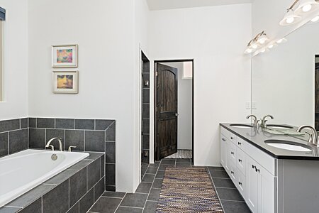 Separate bathtub and double sink in Bedroom #1 bathroom