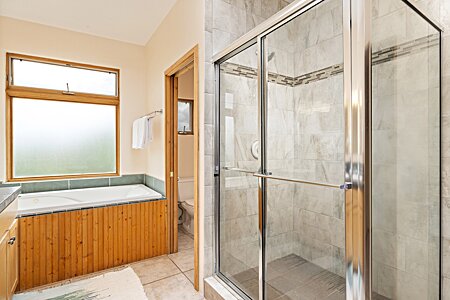 Walk in shower in the primary bathroom with private water closet 