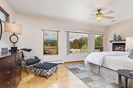 Primary bedroom with lovely views over to the foothills