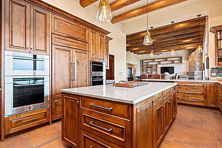 Large Central Food Prep Island with Granite Countertop