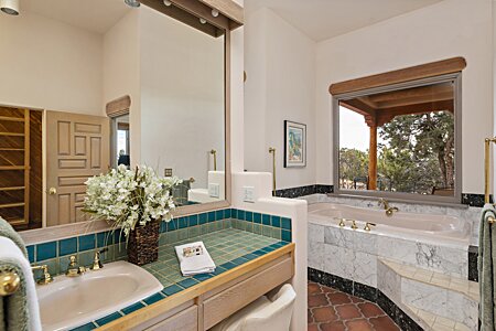 Primary Bath with Double Vanities and Shower and Spa Tub