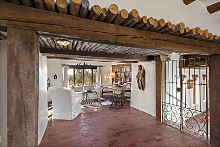 Notice the thickness of the triple adobe walls in the space between the dining room and library... 