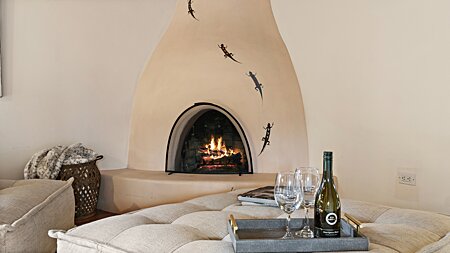 Kiva fireplace in Primary Suite
