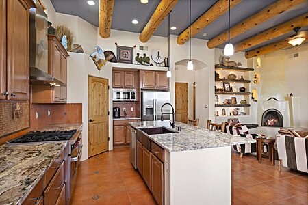 Kitchen, showing Wolf Range/Oven and large Island w/ Casual Eating / Entertaining space