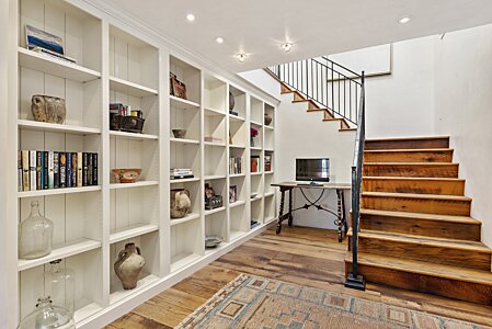 Lower Landing of the Stairway serves as a Library