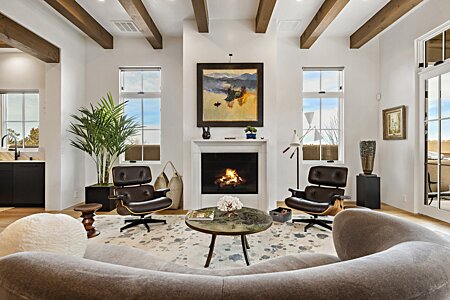 Living area with Ortal fireplace and Sierra Pacific windows facing west 