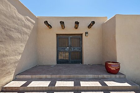 Front entry of Adobe home