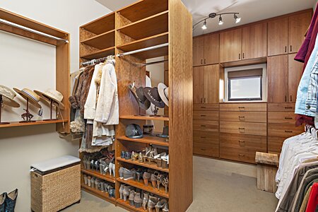 Large, beautifully fitted and finished walk-in closet