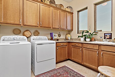 Granite counters and big windows for your utility room projects!