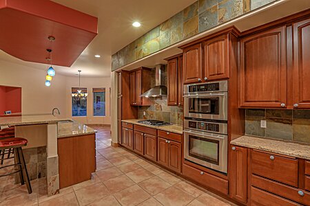 Kitchen with extended granite island