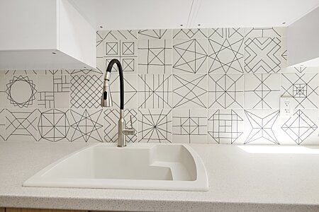 Laundry room custom tile backsplash