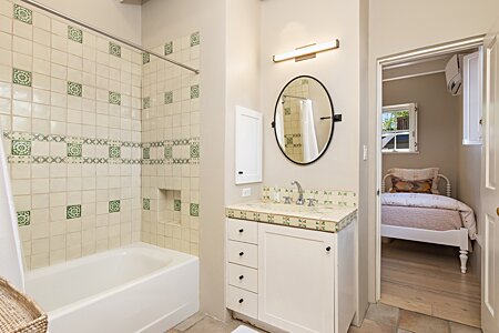 Hand painted Talavera tile Graces the secondary bathroom