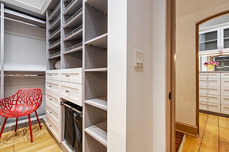 Primary Suite has Two Custom Walk-in Closets