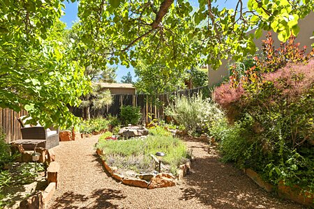 Bonus Backyard with Landscaped Garden and Fountain