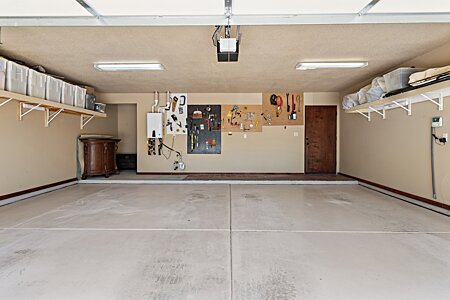 Spacious Garage with shelves on both Sides for ample storage