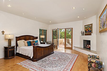 Spacious Master Bedroom with  Fireplace and access to Private Pergola area