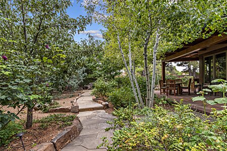 Aspen Trees and Multiple Fruit Trees Adorn The Property