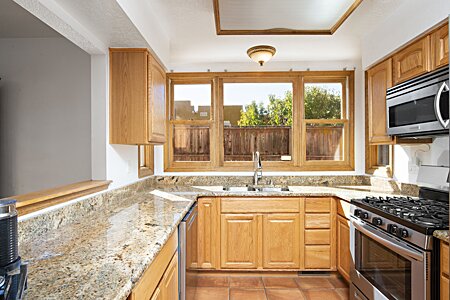 Kitchen with granite counters and Stainless Steel appliances