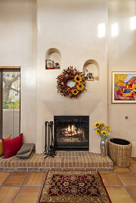 Wood burning fireplace in casual living space