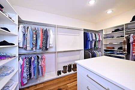 Expansive Master  Bedroom Closet with Two sets of Drawers