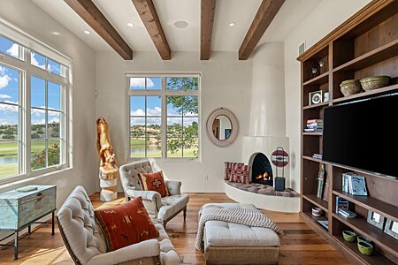 Den off the Entry has two sets of windows to capture the Lake & Golf Course Views