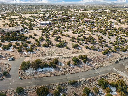 Arial view of long driveway as you approach the lot which is on the right of the photo