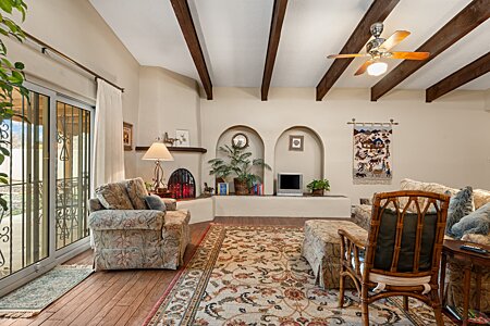 Such a beautiful living room with Kiva fireplace and arched details