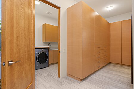 Large Walk-in Closet with Entry to the Laundry Room